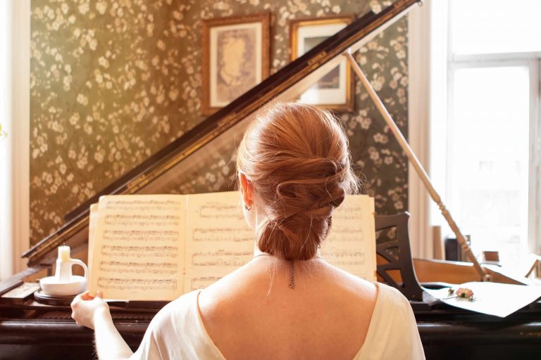 How can a repeated melody avoid sounding predictable?